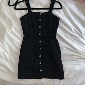 Black mini dress with buttons down middle